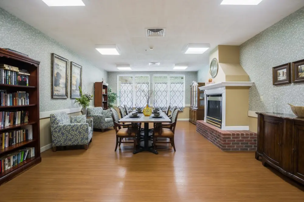 Lobby with fireplace at American House Murfreesboro, a retirement community in Murfreesboro, Tennessee